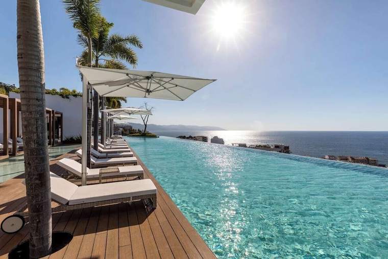 Loungers along the infinity edge