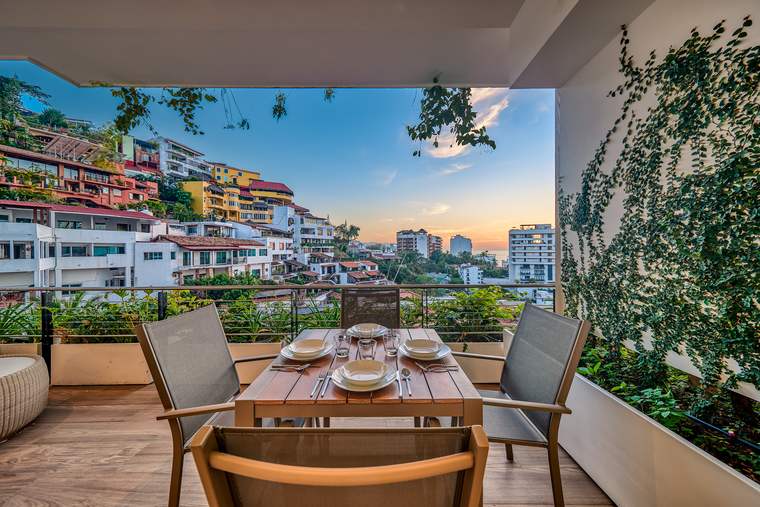 Terrace dining with town views